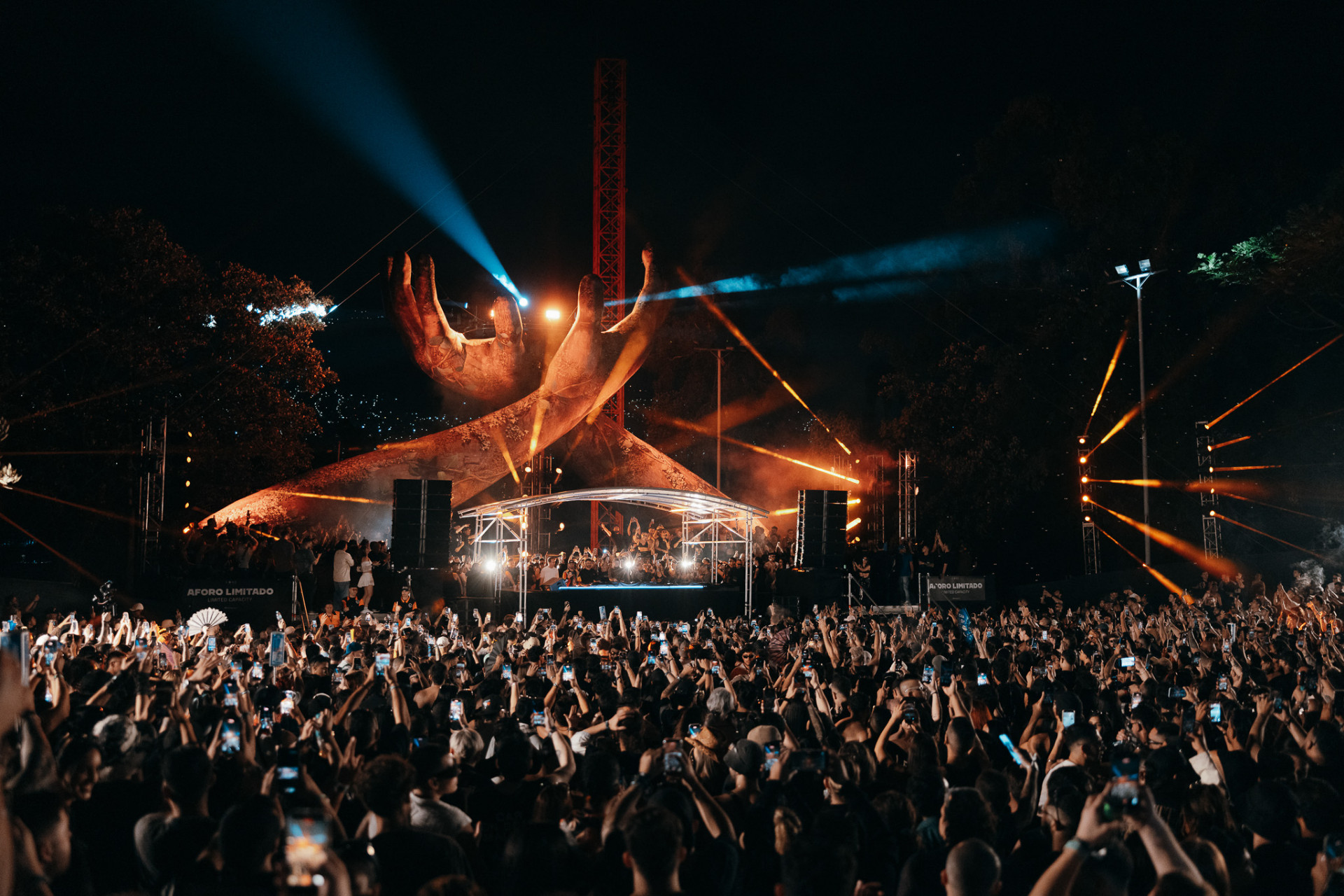 Wide crowd shot lit in warm orange at CORE Melbourne
